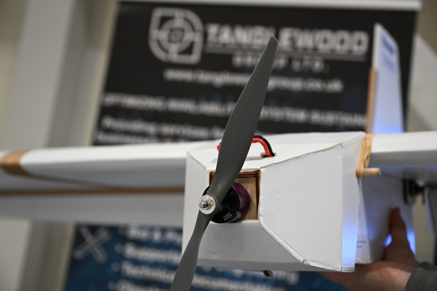 A close-up shot of a white drone displayed in the Tech Hub.