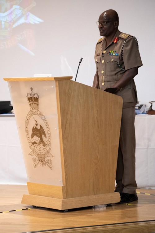 Lt Gen Jonah Mwangi stood behind a lectern presenting to ACSC students.