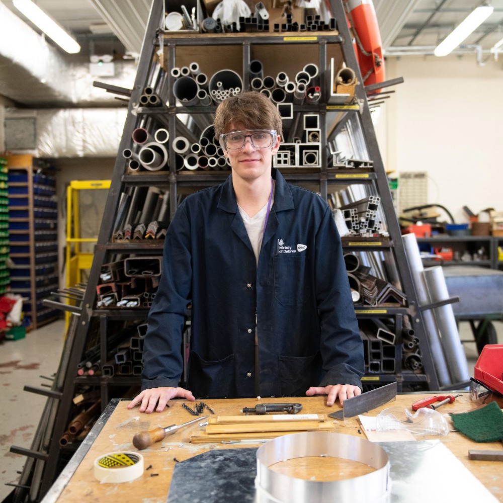 Young male DE&S apprentice in a workshop.
