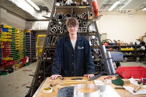 Young male DE&S apprentice in a workshop.