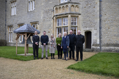 Five MPs and two padres standing outside Beckett House