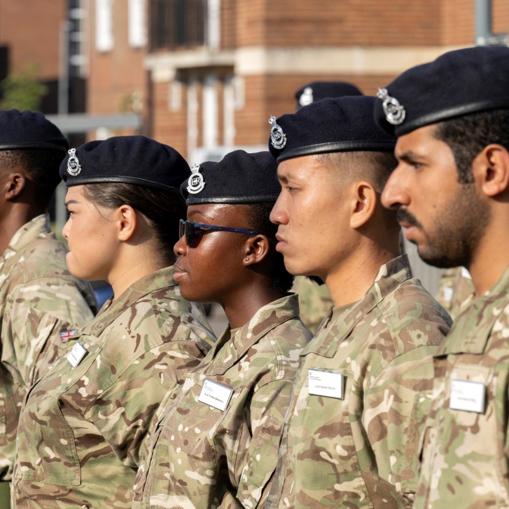 Army cadet stood for inspection during parade.