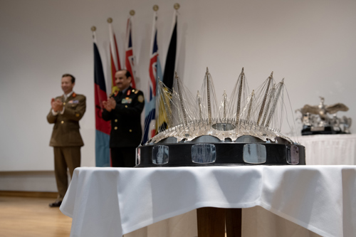 Silver O2 trophy on a table.