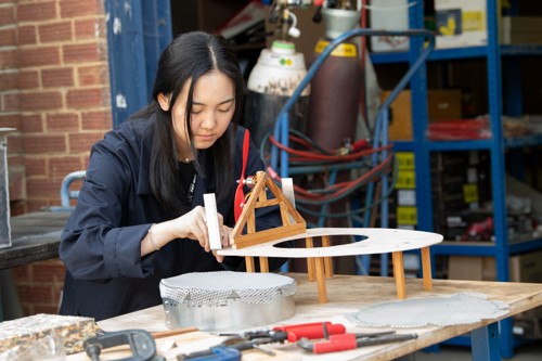 Young female working on project.