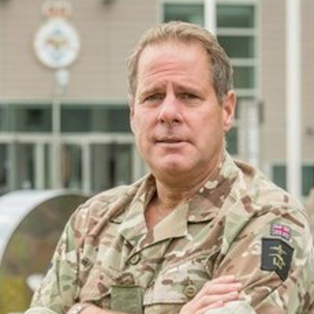 Profile of Lt Gen Copinger-Symes in Army combats with arms folded.